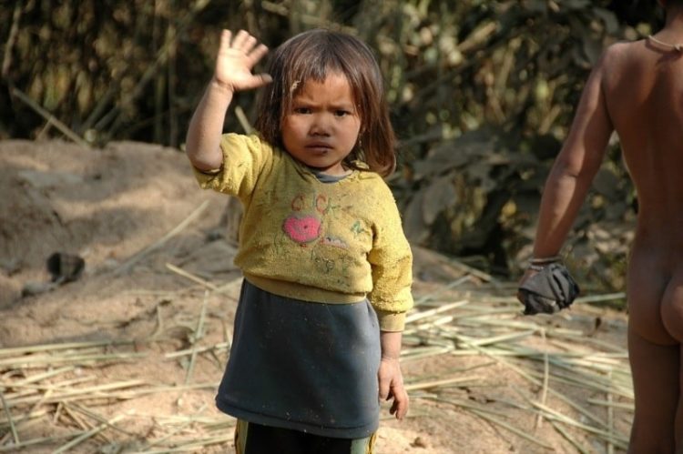 Child Waving Goodbye - Luang Prabang, Laos