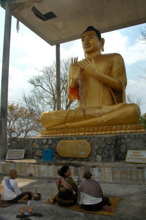 Praying at a Buddhist Temple outside Battambang, Cambodia 
