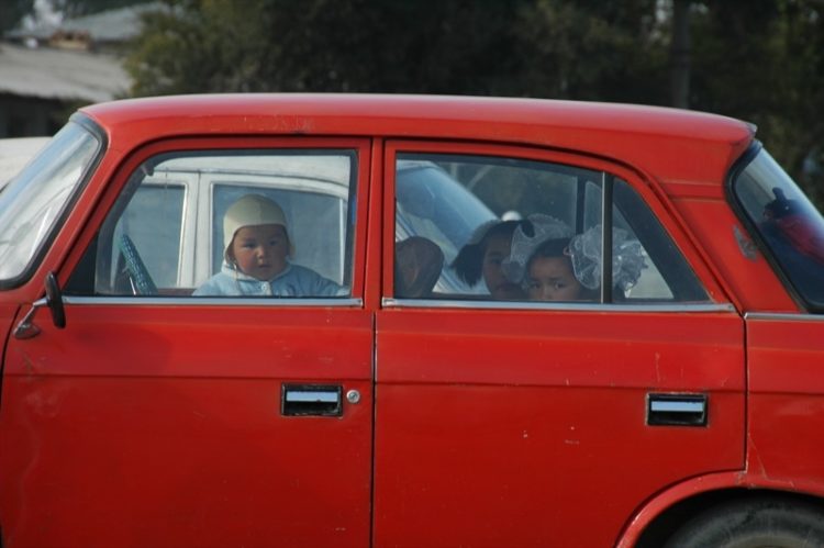 Kyrgyz Children in Red Car