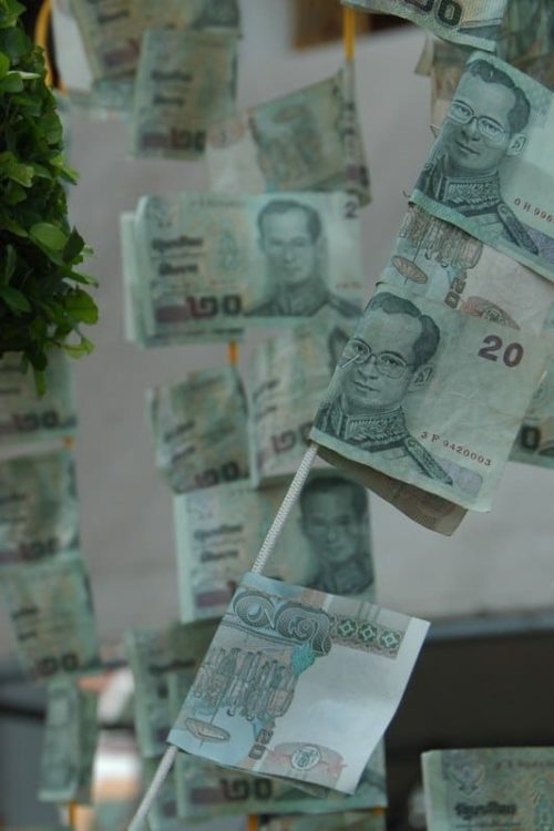 Money Offerings at Wat Arun - Bangkok, Thailand