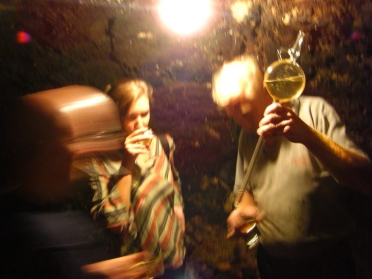 Drinking Wine in Cellar