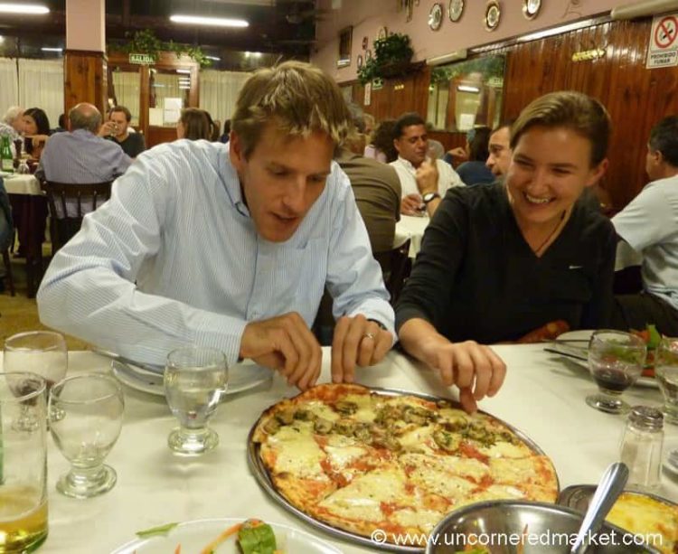 Grabbing for a Slice of Pizza - Buenos Aires, Argentina