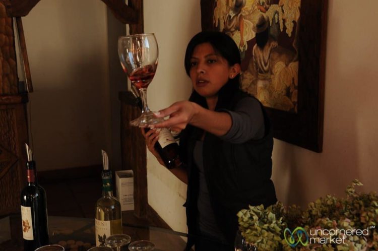 Checking the Color of the Wine - Cafayate, Argentina