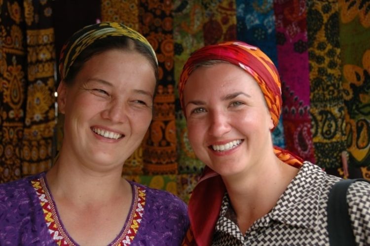 Audrey and Vendor with Colorful Scarves - Ashgabat, Turkmenistan