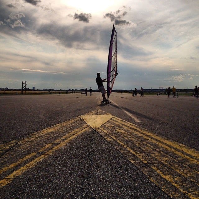 Tempelhof Park, full of kitesurfing and other wind sports.